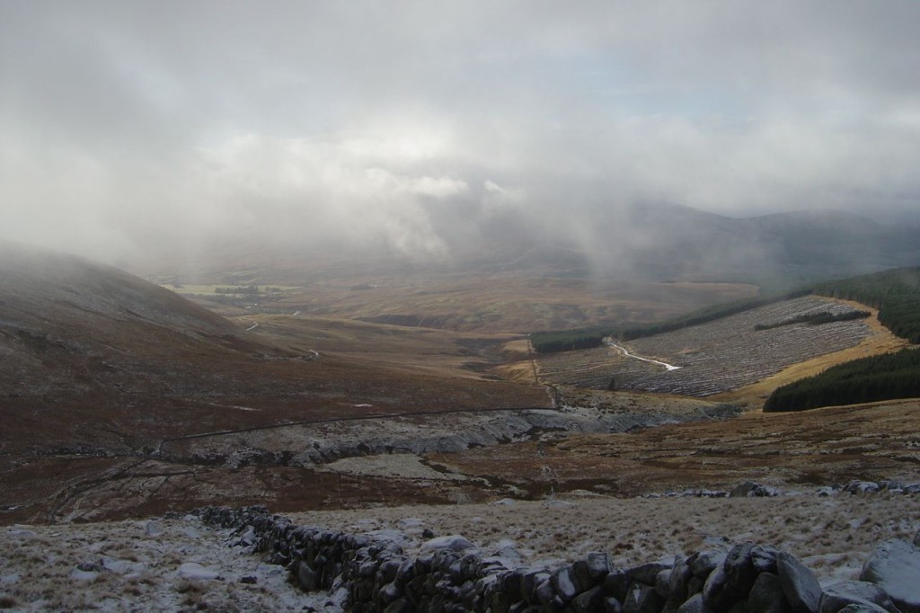 The way down Cairnsmore of Carsphairn, the Rhinns are hidden in cloud.